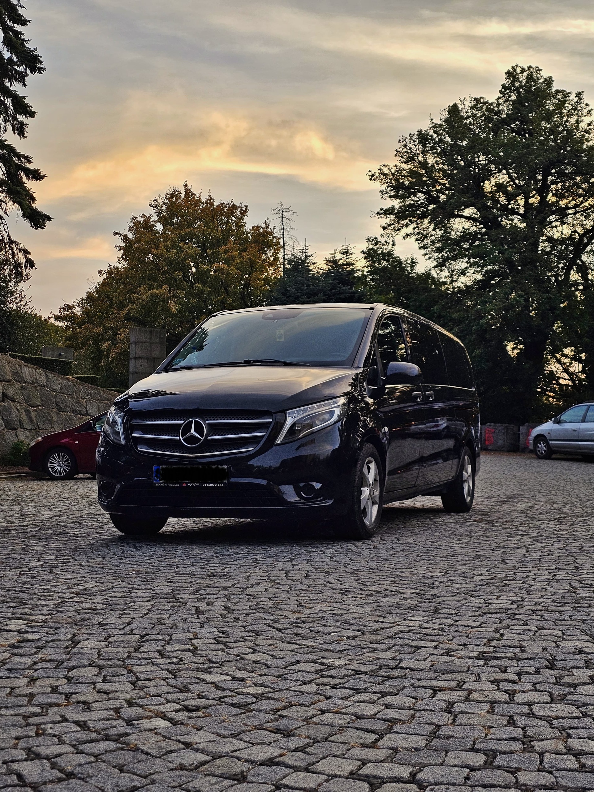 Mercedes passenger van at dusk